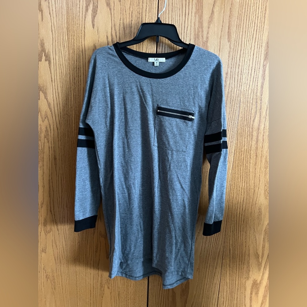 Grey t-shirt dress or sweater with black stripes and pocket detail